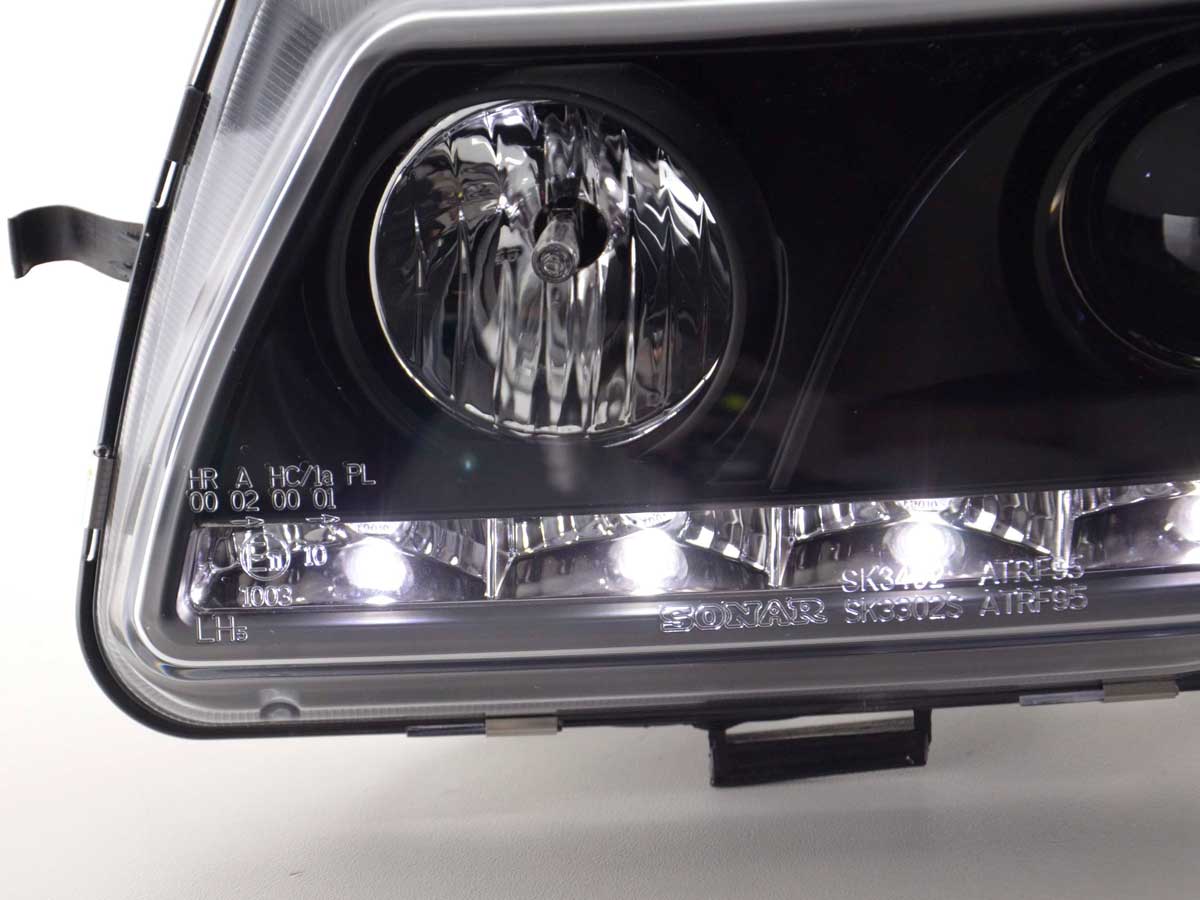 Scheinwerfer Set Daylight LED TFL-Optik Opel Astra F 95-97 schwarz Scheinwerfer Set Daylight LED TFL-Optik Opel Astra F 95-97 schwarz